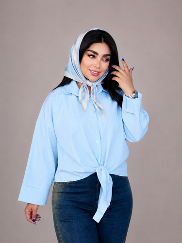 شومیز گرهای زنانه جگوار با طراحی طرحدار و استایل شیک، مناسب برای استفاده روزمره و نیمهرسمی.